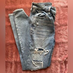 AMERICAN EAGLE medium wash ripped super hi rise stretch denim jeans